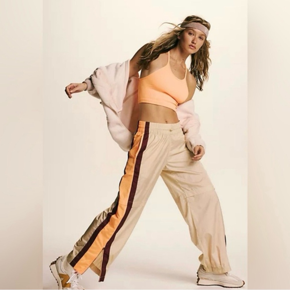 Free People Movement Beige Track Pants with Orange and Maroon Stripes - size L